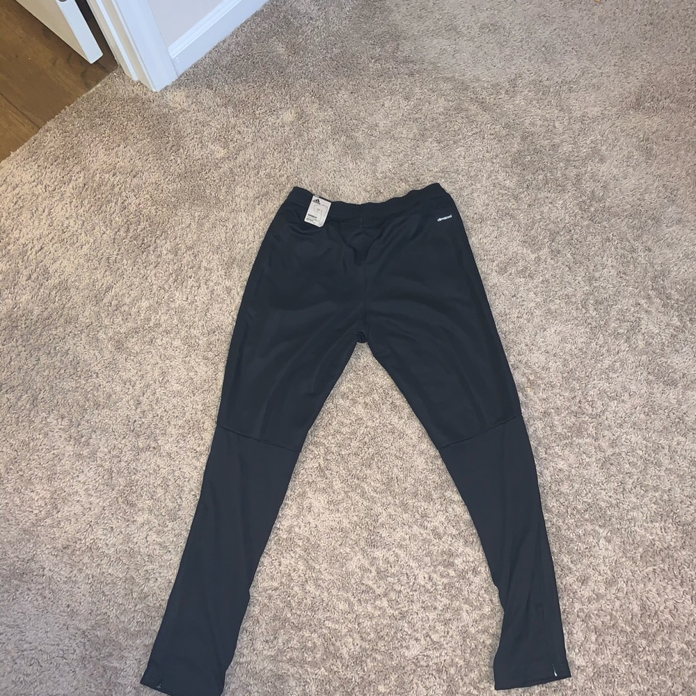 Tapered Fit. Typical Football Fit